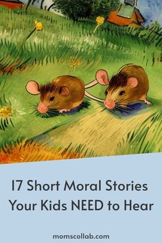 two brown mice sitting on top of a grass covered field next to a blue book cover