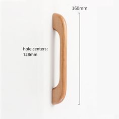 a wooden door handle is shown with measurements