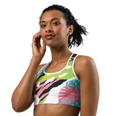 This gorgeous pink art sports bra is made from moisture-wicking material that stays dry during low and medium intensity workouts. The bra has support material in the shoulder straps, double layer front, and a wide elastic band to ensure constant support.• 82% polyester, 18% spandex• Fabric weight: 6.78 oz/yd² (230 g/m²), weight may vary by 5%• Moisture-wicking fabric• Four-way stretch material• Scoop neckline and racerback• Flat seams and bias binding that minimize rubbing• Best for A–C cups• Support material in the shoulder straps, double-layered front, and a wide elastic band under breasts for extra supportThis product is made especially for you as soon as you place an order, which is why it takes us a bit longer to deliver it to you. Making products on demand instead of in bulk helps re Stretch Cotton Sports Bra With Built-in Bra, Pink Compressive Sports Bra With Medium Support, Functional Pink Sports Bra With 4-way Stretch, Pink Sports Bra With Light Support And 4-way Stretch, Multicolor Moisture-wicking Sports Bra, Black Sports Bra, Pink Art, Intense Workout, Elastic Band