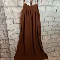 Size M Nwot Brown Knit Material: 76% Cotton, 24% Nylon Square Neckline Cross Straps I. Back Measurements: Length 58”, Armpit To Armpit 15.5” Brown Sleeveless Beach Dress, Bohemian Brown Sleeveless Beach Dress, Brown V-neck Beach Dress, Free People Boho Dress, Bohemian Brown V-neck Boho Dress, Brown Bohemian V-neck Maxi Dress, Long Flowing Dresses, Free People Maxi, Free People Maxi Dress