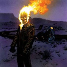 a man standing in the middle of a desert with flames coming out of his face