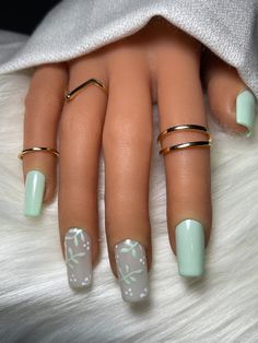 Mint green nails with hand-painted nail art. Need help sizing your nails?  See sizing instructions on my Home Page. Message, text or Email if you have questions. Customizations are available. NewNailz@yahoo.com Cute Nails Acrylic Summer Square, March Nails Coffin Shape, Beautiful Simple Nails Design, Short Mint Green Nail Ideas, Cute Nails Acrylic Short Coffin, Mint Oval Nails, Sage And Blue Nails, Spring 2023 Acrylic Nails, Middle And Ring Finger Accent Nails