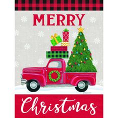 a red truck with a christmas tree on the back