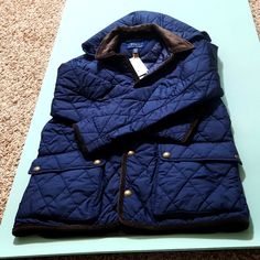 Color Is Navy. Stylish, Classic, Well-Made Jacket For Boys. Signature Embroidered Pony At The Left Chest. Button-Off Hood. Corduroy Point Collar. Snapped Placket. Corduroy Trim Along The Placket, Cuffs, Vent, And Hem. Two Front Waist Snapped Pockets. Double Vent With Snapped Closures. Blue Weatherproof Hooded Jacket For Fall, Blue Weatherproof Long Sleeve Hooded Jacket, Blue Weatherproof Parka For Winter, Blue Weatherproof Hooded Jacket For Cold Weather, Weatherproof Blue Hooded Jacket For Cold Weather, Weatherproof Long Sleeve Blue Outerwear, Blue Weatherproof Long Sleeve Parka, Blue Fleece-lined Puffer Jacket For Fall, Blue Hooded Outerwear With Detachable Hood