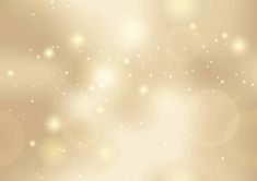 an abstract gold background with sparkles and stars