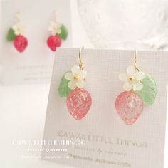 - Please read the full description below - Strawberry earrings - Pink (Gradation effect) / with or without flower. *Each batch has a slightly different shade *Colours change depending on the angle of viewing  * Please note, earring hooks are Hypoallergenic. However, the rest of the parts are not. * Colours are graded and each one is unique - Please refer to the pictures I am trying to capture the colours of the items as best as possible, however, colours may vary slightly due to lighting conditi Strawberry Accessories, Fantastic Fashion, Strawberry Earrings, Pretty Accessories, Beaded Leaf, Silver Wolf, Pink Strawberry, Fruit Earrings, Plastic Flowers