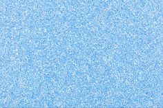 an abstract blue background with small speckles