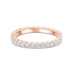 a rose gold wedding band with white diamonds