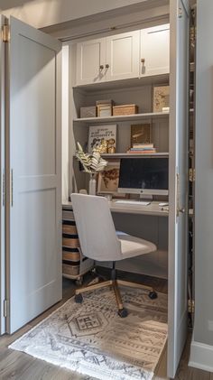 a home office with an open door leading to the bedroom