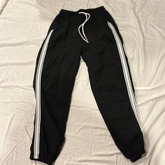 Black Size Small Jogger With Textured White Stripe On Leg And Red White And Blue Beading Detail Never Worn Casual Fitted Black Joggers, Casual Black Fitted Joggers, Black High Waist Casual Joggers, Casual High Waist Black Joggers, Trendy Black Stretch Sweatpants, Trendy Black High-waist Sweatpants, Trendy Fitted Black Sweatpants, Black Joggers, Source Unknown