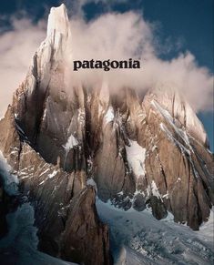 the top of a mountain covered in snow and clouds with the word patagonia above it