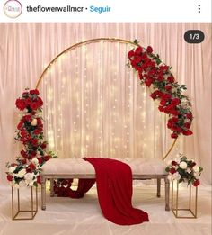 an arch decorated with flowers and greenery for a wedding ceremony is shown on the instagram page