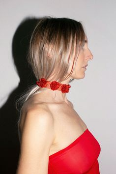 Adjustable rusty red ribbon choker with florette accents. Chain link closure. Fabric is 78% vegetal polyamide, 15% natural agate, 5% brass, 2% tin. Measures 15" in total length. Adjusts to fit 11.5" - 15". Chic Spring Party Choker, Summer Party Flower Shaped Choker, Adjustable Red Summer Choker, Fabric Choker, Ribbon Earrings, Ribbon Choker, Cool Girl Style, Editorial Hair, Paloma Wool