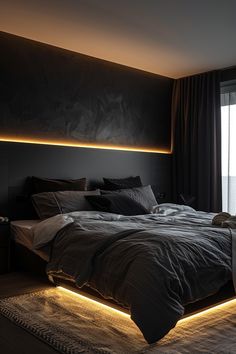 a large bed sitting in a bedroom next to a window with light coming through it