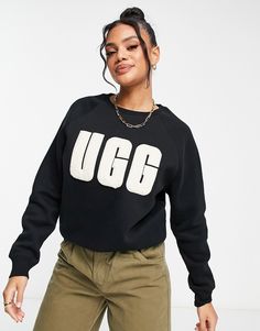 Hoodies & Sweatshirts by UGG Laid-back looks Crew neck Logo embroidery detail Ribbed trim Regular fit Trendy Long-sleeve Tops With Logo Detail, Trendy Long Sleeve Tops With Logo Detail, Trendy Long Sleeve Logo Sweatshirt, Black Logo Sweater For Fall, Casual Black Sweater With Logo, Black Logo Sweatshirt For Fall, Winter Trendy Sweatshirt With Logo Detail, Fall Logo Sweatshirt In Athleisure Style, Winter Relaxed Fit Sweater With Logo