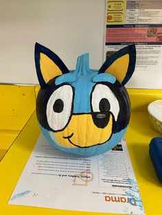 a paper mache with an animal face on it