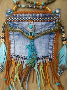 a purse made out of jeans and beads