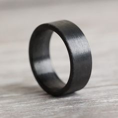 The Erebus Thorum Black Carbon Fiber Ring Carbon Fiber Wedding Band, God Of Darkness, Carbon Fiber Rings, Wood Ring Box, Black Tones, Greek God, Wood Ring, Wood Rings, Silicon Bands