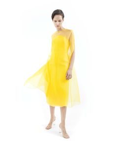 Dune Yellow cape gown made from silk organza, features wide A-line silhouette, round neck, midi length, hook-buttoning on the back and no lining.Offered with matching bustier midi dress sold separately (as shown on pictures) or with lining on request. Flower application is on request with no surcharge. 100% Silk organzaNo liningHook button on the backDry cleanMade in Milan Sheer Midi Dress With Fitted Bodice For Evening, Organza Midi Dress With Sheer Bodice For Evening, Cocktail Midi-length Organza Evening Dress, Organza Midi Dress With Fitted Bodice, Summer A-line Organza Evening Dress, Organza Midi-length Evening Dress, Organza Midi Length Evening Dress, Organza Evening Dress, Midi Length, Summer Party Silk Chiffon Midi Dress