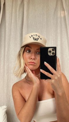 Is this not the cutest thing you’ve ever seen? Social Butterfly are we kidding? Immediately yes. It’s a tan/khaki color with black embroidery *heart eyes*. My favorite part is the rope detail on top, makes it so elevated. Anyways, let’s all grab one of these and start a club, ya? "Social Butterfly" foam trucker hat Tan colored with black embroidery Adjustable snap back Half mesh Rope detail One size Trendy Cream Baseball Cap, Trendy One Size Hats For Everyday, Trendy Everyday Hats, Adjustable Beige Snapback Hat With Short Brim, Trendy Beige Baseball Cap For Everyday, Trendy Beige Trucker Hat, Trendy Cream Trucker Hat, Cute Adjustable Hats For Everyday, Cute Adjustable Hats