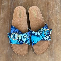 Pretty Blue Floral Print With Gold Tone Buckle Size 8 Brand New, Never Worn Casual Adjustable Blue Sandals, Casual Blue Adjustable Sandals, Casual Blue Sandals For Beach, Casual Adjustable Sandals, Casual Beach Sandals In Fabric, Casual Fabric Sandals For Beach, Casual Fabric Beach Sandals, Blue Fabric Sandals With Round Toe, Blue Fabric Round Toe Sandals