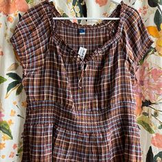 Super Cute And Comfy! Brown Plaid Peplum Shirt From Old Navy. Size Xxl. A Little Big For Me So I Never Got To Wear It. Fall Smocked Short Sleeve Top With Ruffles, Fall Smocked Short Sleeve Top, Fall Short Sleeve Smocked Top With Ruffles, Fall Smock Top With Short Sleeves, Fall Smocked Top With Ruffles And Short Sleeves, Fall Smocked Short Sleeve Blouse, Smock Top With Short Sleeves For Fall, Casual Short Sleeve Peasant Top For Beach, Fall Smock Blouse With Short Sleeves