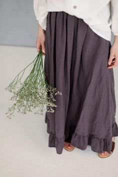 Linen maxi skirt with ruffles for women. Romantic, flowing and soft: made from soft linen it feels extremely smooth and pleasant on the skin. * Made of 100% natural washed and soft medium weight OEKO-TEX certified linen (160g). * Linen skirt with two inner pockets on the sides. * Ruffled bottom. * High-waisted, flared shape skirt. * Color in the picture: purple. Discover more of La Petite Alice organic linen clothes and accessories here: https://www.etsy.com/shop/Lapetitealice **The shipping cos Bohemian Midi Dress With Ruffled Skirt, Cottagecore Long Skirt With Ruffles, Bohemian Flowy Linen Maxi Skirt, Flowy Linen Bohemian Maxi Skirt, Long Flowy Skirt With Floral Embroidery, Bohemian Linen Maxi Skirt, Bohemian Long Linen Maxi Skirt, Long Skirt With Floral Embroidery, Bohemian Linen Maxi Skirt With Lined Detail