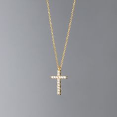 The Cross Necklace For Women The Cross Pendant Necklace embodies classic simplicity, offering a timeless elegance that enhances any outfit. Its sparkling simulated diamond center adds a touch of luxury, creating a refined yet understated look that’s perfect for both casual and formal occasions. Crafted from sterling silver and layered with platinum, this pendant combines durability with a lasting shine. The minimalist cross design brings a subtle sophistication, making it an ideal choice for eve