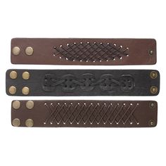 three different types of leather belts with metal studs on each side and one is brown