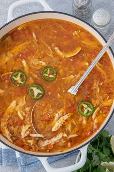 mexican chicken and rice soup in a white bowl