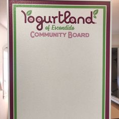 a sign that says yogurtland of exentities community board on it