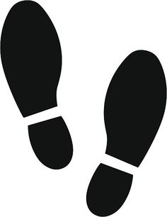 a black and white image of a pair of feet with one shoe on the ground