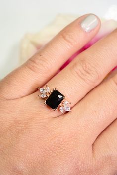 This gorgeous, timeless ring features our favorite black onyx design and hand picked crystals. ✦ DETAILS ✦ ✧ Handcrafted ✧ 2.0 Carat center stone ✧ Black onyx and cz crystals ✧ Sizes 3.75-11.25 ✧ Sterling Silver 925 or Rose Gold Filled or Rose Gold/Sterling Silver 925 ✧ This ring will arrive ready to gift in a Kherish Jewelry Pouch. ✧ PRE-ORDER: Items that are preorder only will ship within 10-15 business days. You will receive an email with the updated processing time if you order a size/option Black Jewelry With Accent Stones For Promise, Black Promise Ring With Polished Finish, Black Open Ring For Promise, Black Cubic Zirconia Rings As Gift, Black Open Ring Jewelry For Promise, Black Cubic Zirconia Rings For Gift, Black Sterling Silver Crystal Ring For Wedding, Black Sterling Silver Jewelry For Wedding, Black Open Ring Jewelry For Anniversary