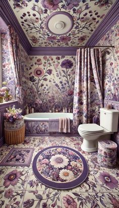 a bathroom with floral wallpaper and rugs on the floor next to a toilet