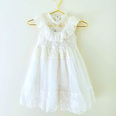 Girls Like New Never Worn Lace Dress White Dress For First Communion In Spring, Cute Fitted Dress For First Communion, White Dress With Lace Trim For Dress-up, Cute Off White Dress With Ruffles, Cute Off White Ruffled Dress, White Ruffled Baptism Dress For Summer, Cute White Dress For Dress-up Occasion, White Sleeveless Baptism Dress For Spring, Sleeveless Ruffled Baptism Dress For Summer