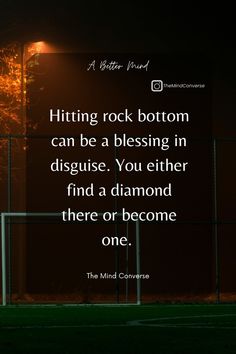 a soccer field at night with the quote hitting rock bottom can be a blessing in disgust you either find a diamond there or become one