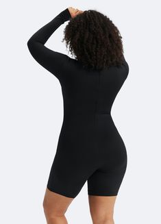 No doubt about it, you’re going to turn heads when you rock the Classic Long Sleeve Romper. The ideal combination of wearable and statement-making, this romper can be styled with a leather jacket and sneakers or rocked at the gym while you’re perfecting your squat. Either way, people will ask where you got your new romper. Black Athleisure Bodysuit With Thumbholes, Black Long Sleeve Bodysuit For Sports, Black Long Sleeve Sports Bodysuit, Black Long Sleeve Bodysuit For Gym, Black Long Sleeve Bodysuit For Workout, Long Sleeve Black Workout Bodysuit, Black Long Sleeve Workout Bodysuit, Casual Compressive Black Bodysuit, Casual Black Long Sleeve Unitard