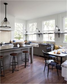 the kitchen is clean and ready to be used as a dining room or living room