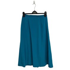 Vintage Graver Studio Women's Long Teal Blue A-Line Skirt Size M Material:100% Polyester Measurements Approx.: All Measurements Are Taken With Garment Flat And Doubled When Necessary. Waistline: 26"Inches Hips: 43"Inches Length Skirt: 34"Inches Please See Photos And Measurements For Exact Condition And Details, Every Designer Has Different Standards For Sizing. We Will Combine Shipping Cost. Reasonable Offers Will Be Accepted Immediately. We Try Our Best To Give The Exact Color In The Photos. Us Blue A-line Maxi Skirt With Lining, Blue Fitted A-line Maxi Skirt, Blue Midi Skirt With Comfort Stretch, Blue Flared Pleated Skirt For Work, Light Blue Long Lined Skirt, Blue Pencil Maxi Skirt For Spring, Blue Midi Pencil Skirt For Summer, Blue Stretch Skirt For Workwear, Blue Relaxed Fit Pencil Skirt For Summer