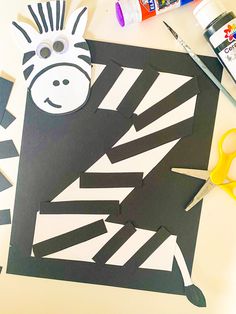 the zebra is cut out and ready to be used as a decoration for an art project