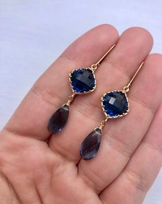 Blue Quartz Earrings, Dark Blue Statement Earrings, Royal Blue Gold Drops, September Birthstone, Navy Blue Jewelry, Indigo Blue Gift for her These earrings feature 10mm faceted deep blue quartz diamond shape stones bezeled set in gold filled and suspended from them are 12 mm natural blue quartz teardrops. The earrings are suspended from gold filled lever back ear wires. These are deep rich blue color, ideal for summer outfits, very feminine and elegant color, that will match many outfits in your Blue Sapphire Dangle Jewelry, Blue Gemstone Teardrop Earrings For Formal Events, Blue Dangle Crystal Earrings For Formal Occasions, Elegant Blue Drop Crystal Earrings, Elegant Blue Earrings With Ear Wire, Elegant Blue Crystal Earrings For Gift, Blue Gemstone Crystal Drop Earrings, Blue Long Drop Teardrop Earrings, Blue Gemstone Dangle Earrings