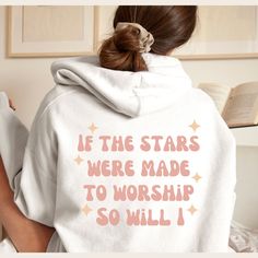 If The Stars Were Made To Worship So Will I Hooded Sweatshirt is a perfect addition to any wardrobe and Christian gift idea. A unisex heavy blend hooded sweatshirt is relaxation itself. The material is a thick blend of cotton and polyester. This makes for a plush, soft feel alongside warmth. It's also a great surface for printing. There are no side seams. A spacious kangaroo pocket hangs in front. The hood's drawstring is the same color as the base sweater. .: 50% cotton, 50% polyester .: Medium If The Stars Were Made To Worship Sweatshirt, What To Wear To A Christian Concert, Christian Merch Aesthetic, If The Stars Were Made To Worship, Cute Christian Sweatshirts, Christian Sweatshirt Designs, Christian Outfits For Women, Cute Christian Outfits, Christian Gift Ideas