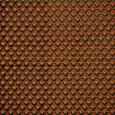 an orange and black checkered pattern with some brown dots