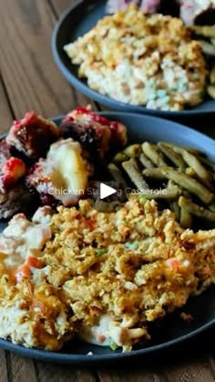 two plates filled with different types of food on top of a wooden table next to each other