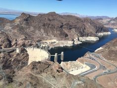 an aerial view of the hoover dam and surrounding mountains