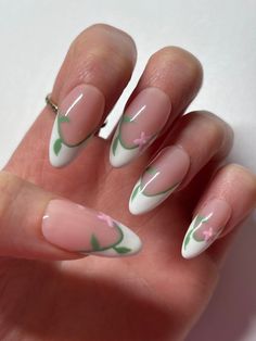 Warning: These nail art ideas may cause extreme jealousy and an overwhelming desire to promptly schedule your next appointment at the salon! So, if you’re not prepared to have the most enviable nails in town, it may be best to turn back now. .  .. Minimilastic Nails, Mother’s Day Nail Inspiration, Spring Nail Art Designs Flowers, Cute French Tip Nail Ideas, French Tips Nails With Design, Flower Butterfly Nails, May Nail Art, Floral French Tip Nails, Flower French Tip Nails