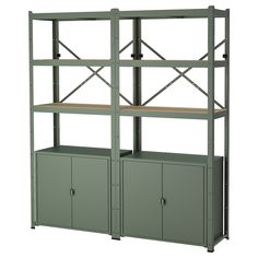 a green bookcase with two doors and three shelves