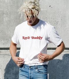 -Gildan 5000 Brand Shirts -Unisex Adult Sizing -Props used in photos are NOT included with purchase Check out this design on other products! Sweatshirts: https://www.etsy.com/listing/1435859000/rave-daddy-sweatshirt-festival?click_key=ec7a7c87e8a938bbd4b71de25f79f6abfb1975df%3A1435859000&click_sum=91105e3d&ref=shop_home_active_6&pro=1 Fiber Composition -Solid colors are 100% cotton; Heather colors are 50% cotton, 50% polyester (Sport Grey is 90% cotton, 10% polyester); Antique colors are 60% cot Rave Shirts, Skate T Shirts, Festival T Shirts, Funny Tshirts, Cotton Tee, Short Sleeve Tee, Classic T Shirts, Shirt Designs, Tee Shirts