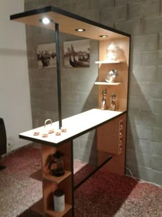 a room with a table and shelves in it