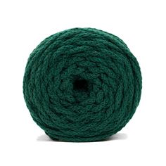 a ball of green yarn on a white background